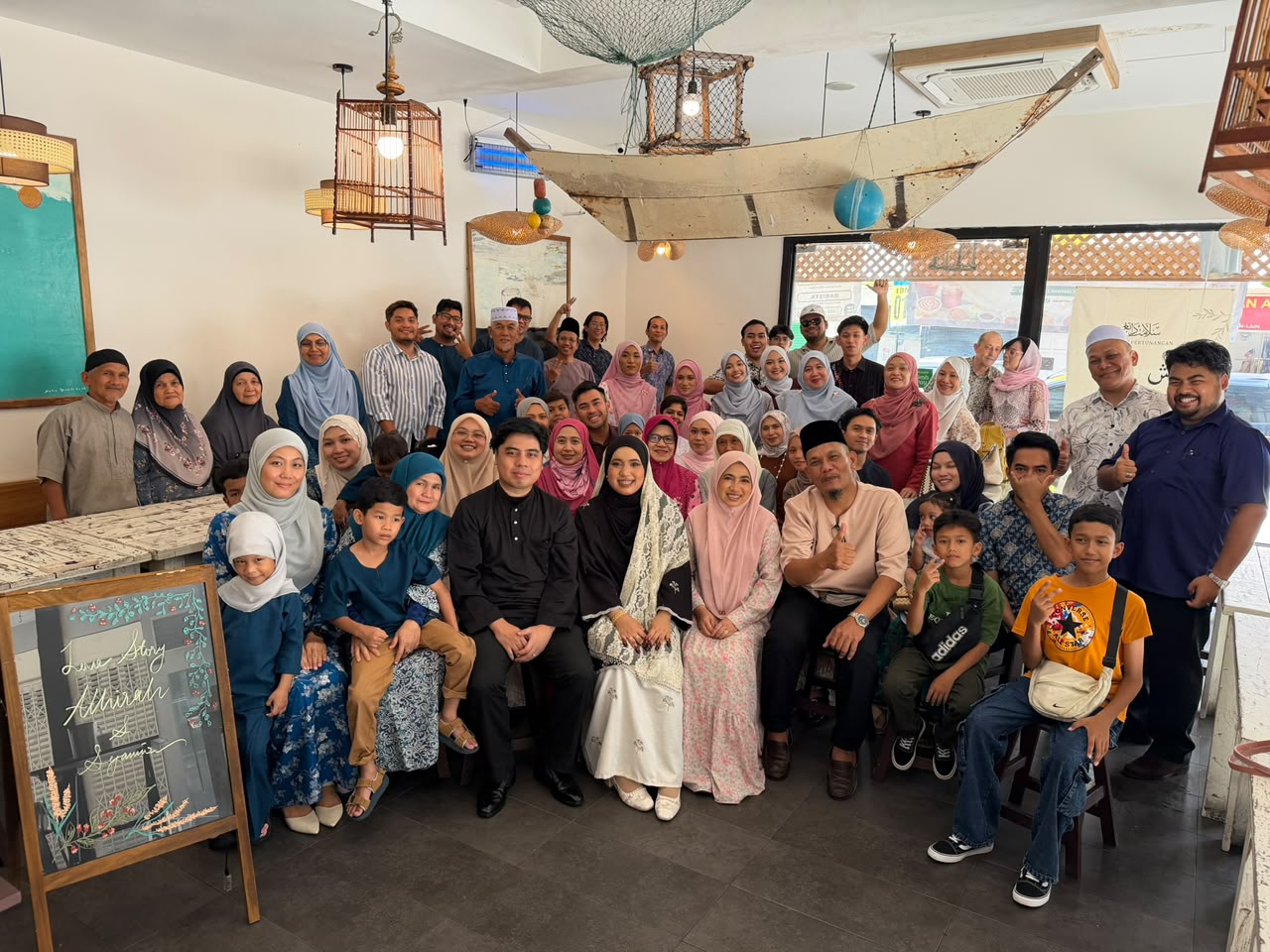 Athirah and Syamir with their extended family